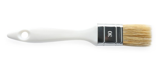 Photo of Paint brush with plastic handle on white background