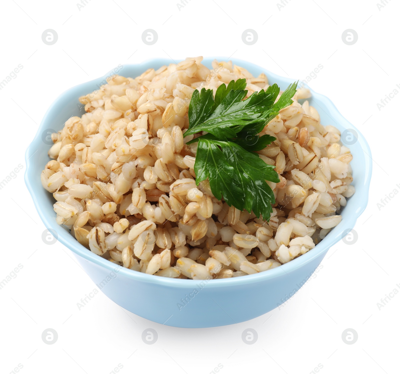 Photo of Delicious pearl barley with parsley in bowl isolated on white