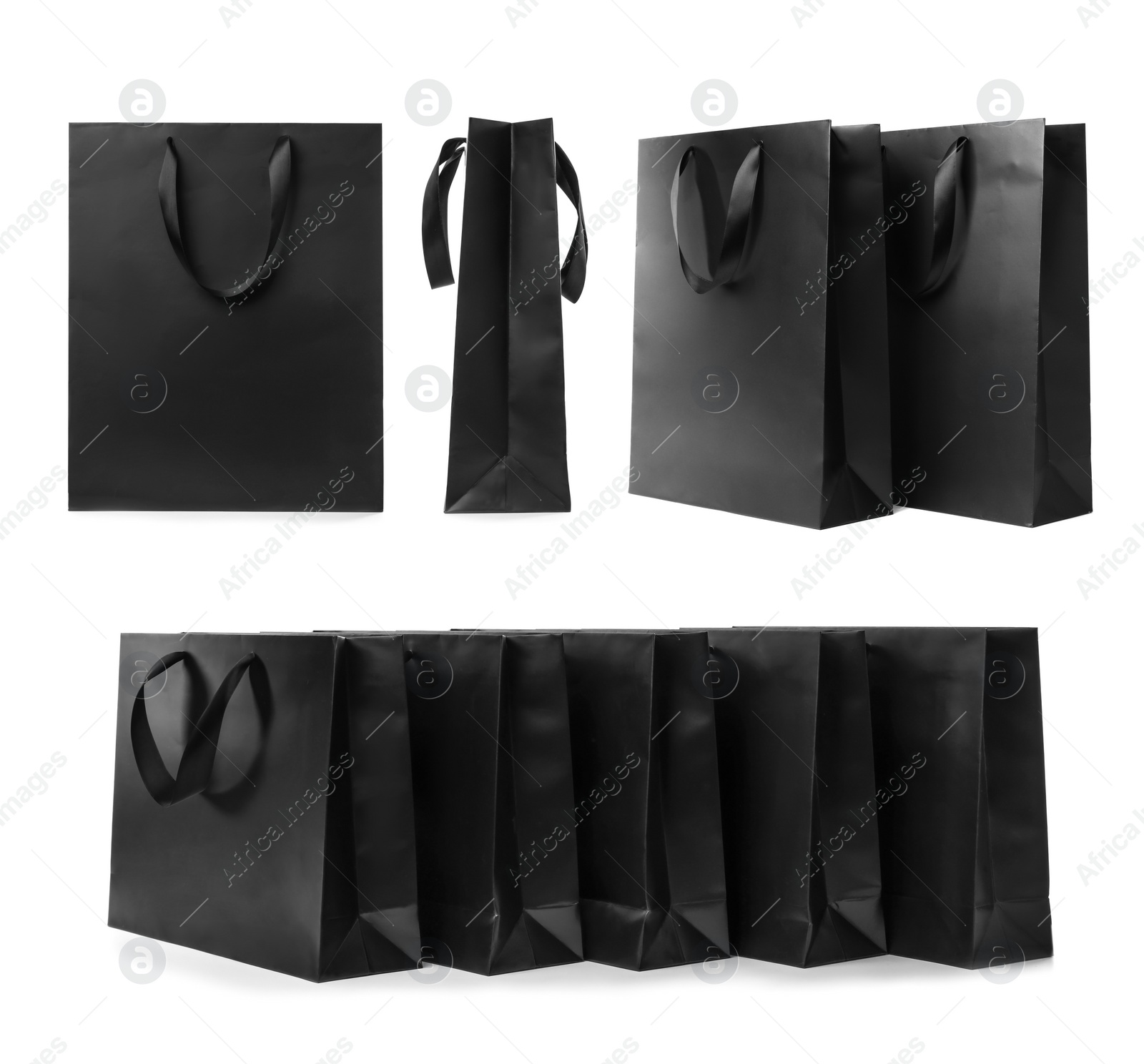 Image of Set with black paper shopping bags on white background