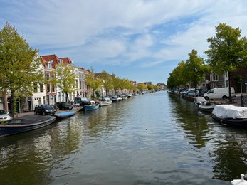 Photo of Beautiful viewbuildings near canal and boats on sunny day
