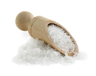 Photo of Heap of natural salt and wooden scoop isolated on white