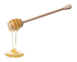 Photo of Natural honey dripping from dipper on white background