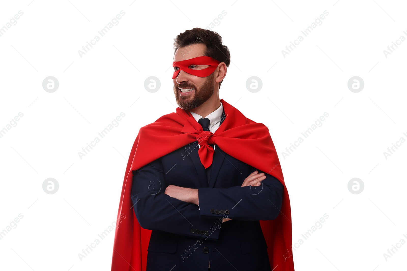 Photo of Happy businessman wearing red superhero cape and mask on white background