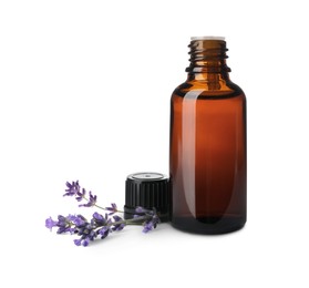 Image of Bottle of lavender essential oil and flowers on white background