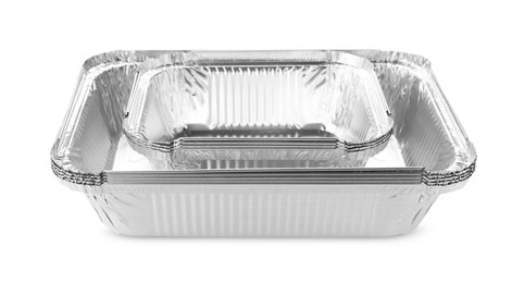 Photo of Many different aluminum foil containers isolated on white