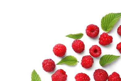 Tasty ripe raspberries and green leaves on white background, flat lay. Space for text