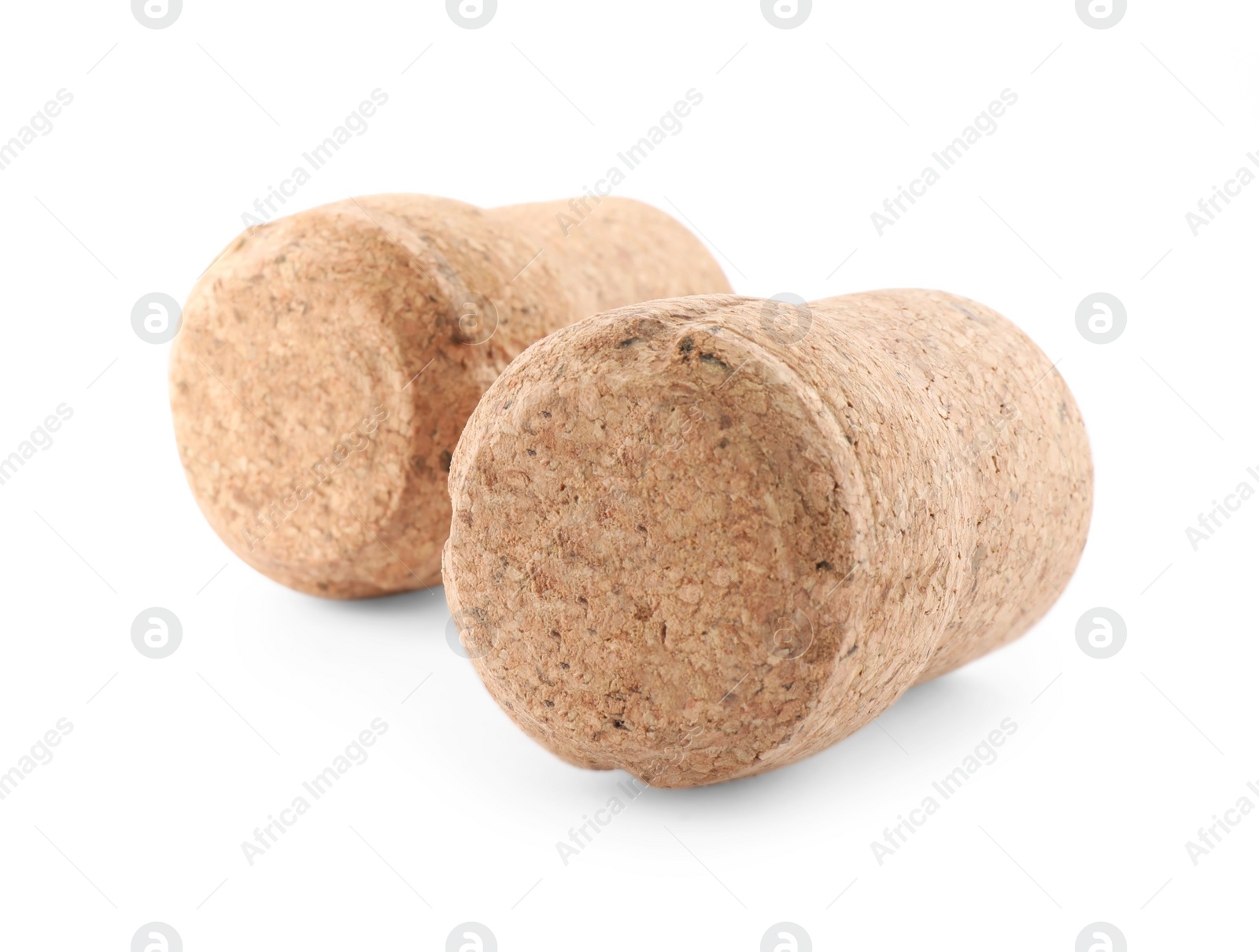 Photo of Two sparkling wine corks on white background