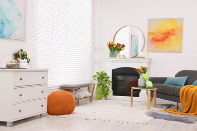 Beautiful Easter decorations and furniture in stylish room