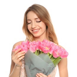 Photo of Portrait of smiling young girl with beautiful tulips on white background. International Women's Day