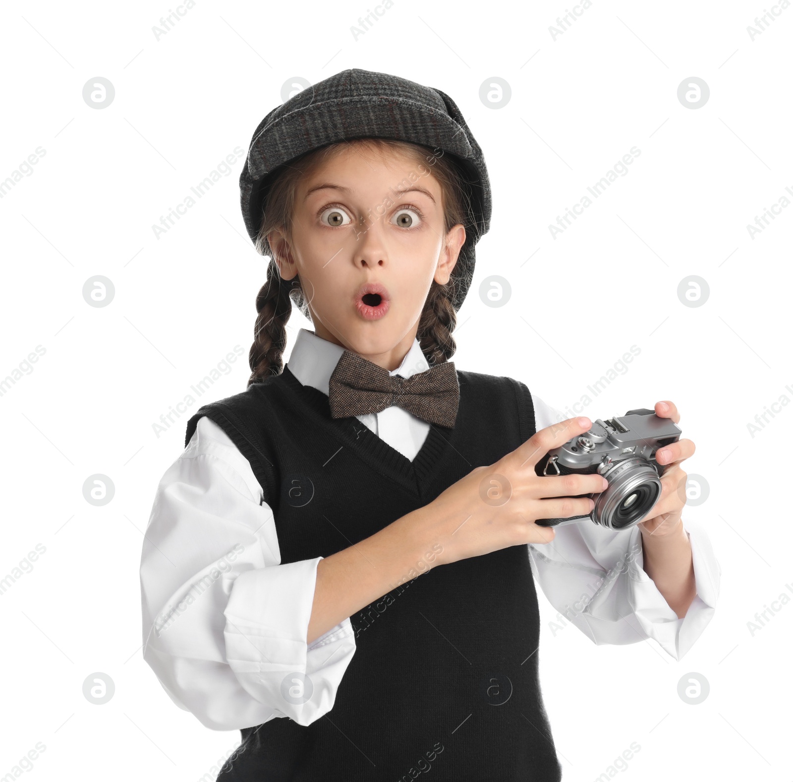 Photo of Cute little detective with vintage camera on white background