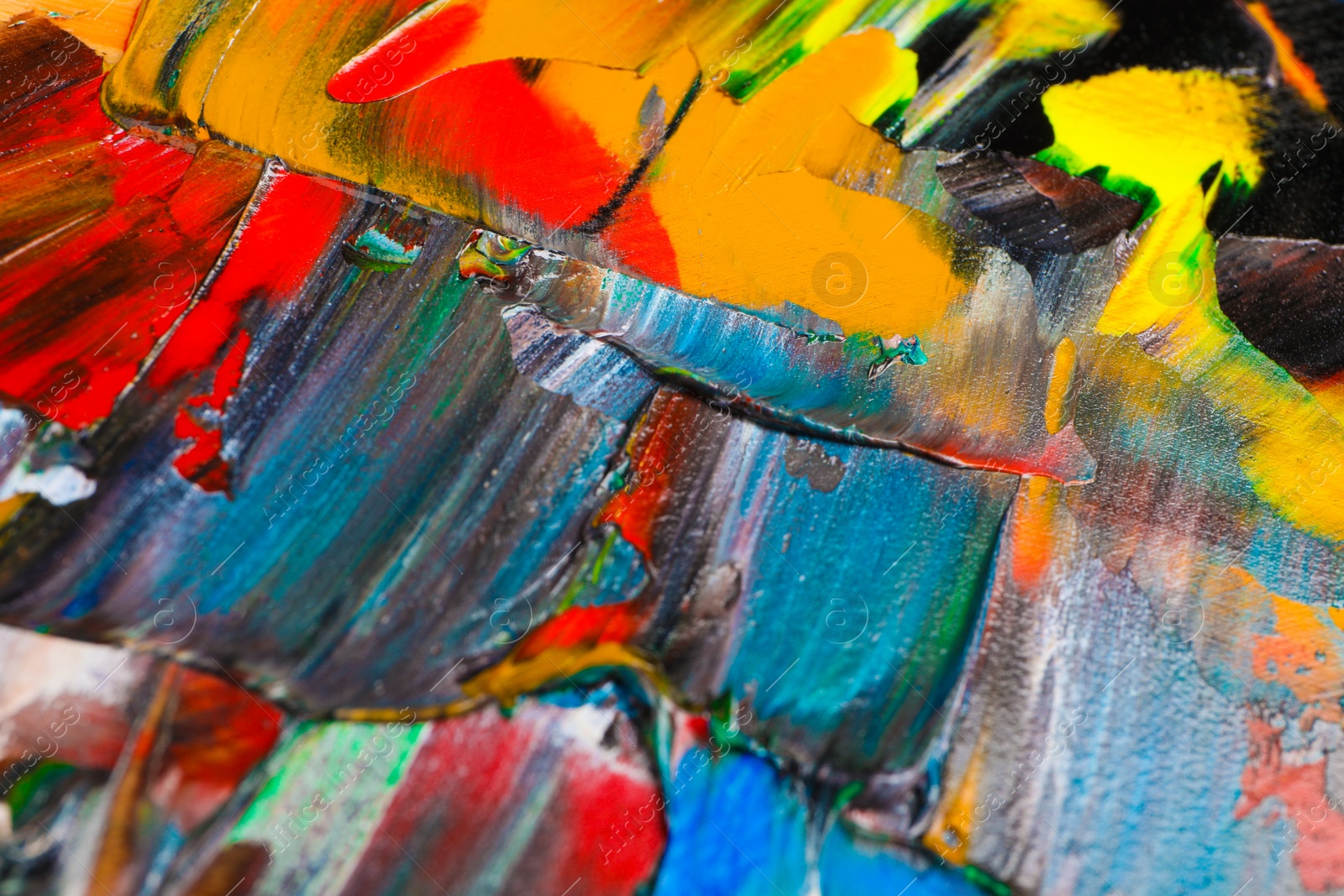 Photo of Abstract colorful acrylic paint as background, top view