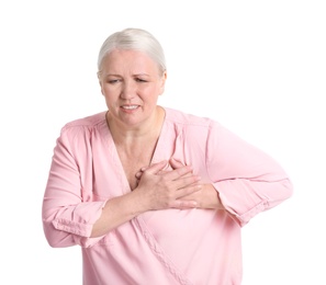 Mature woman having heart attack on white background