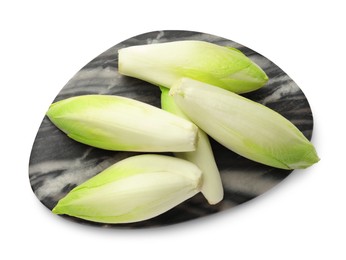 Raw ripe chicories on white background, top view