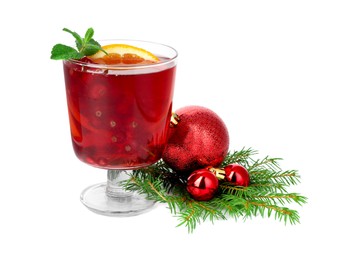 Photo of Aromatic Christmas Sangria in glass and festive decor isolated on white