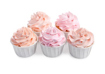 Photo of Tasty cupcakes with cream isolated on white