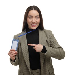 Photo of Happy woman pointing at vip pass badge on white background