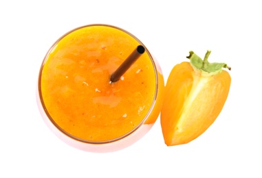 Photo of Tasty persimmon smoothie with straw and fruit isolated on white, top view