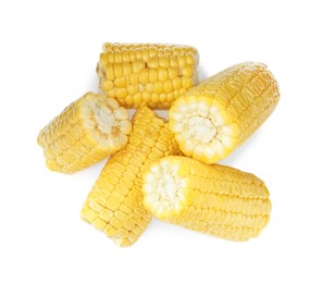 Photo of Pieces of corncobs on white background, top view