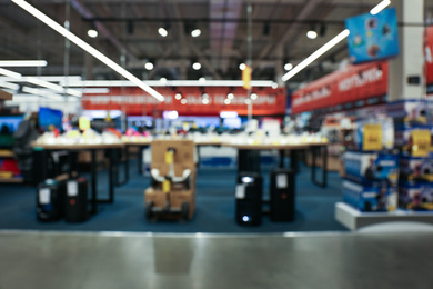 Photo of Blurred view of shopping mall interior. Bokeh effect