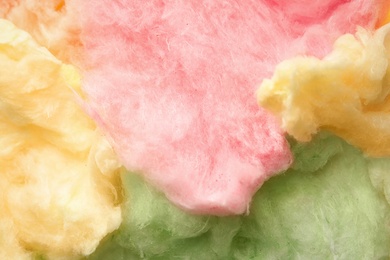 Photo of Colorful fluffy cotton candy as background, closeup
