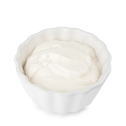 Photo of Bowl with sour cream on white background