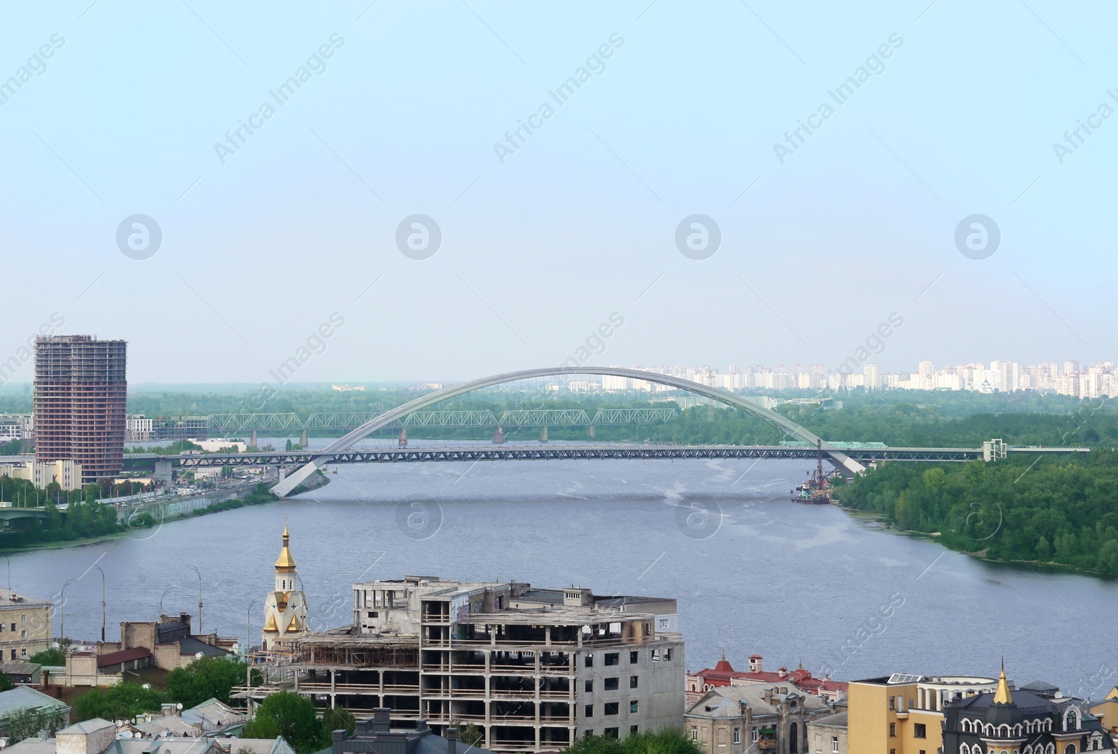 Photo of Beautiful cityscape with modern bridge over river