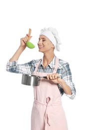 Female chef holding ladle and saucepan on white background