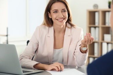 Photo of Human resources manager conducting job interview with applicant in office