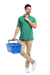 Photo of Young man with empty shopping basket isolated on white