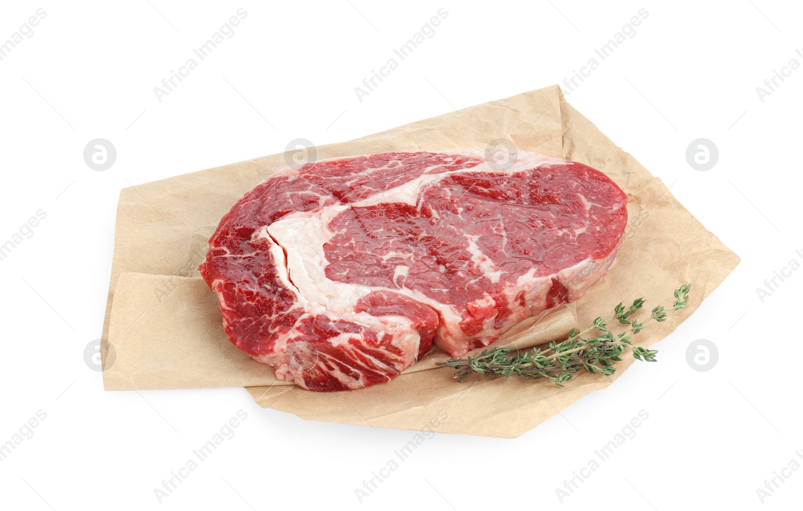 Photo of Piece of fresh beef meat and thyme isolated on white