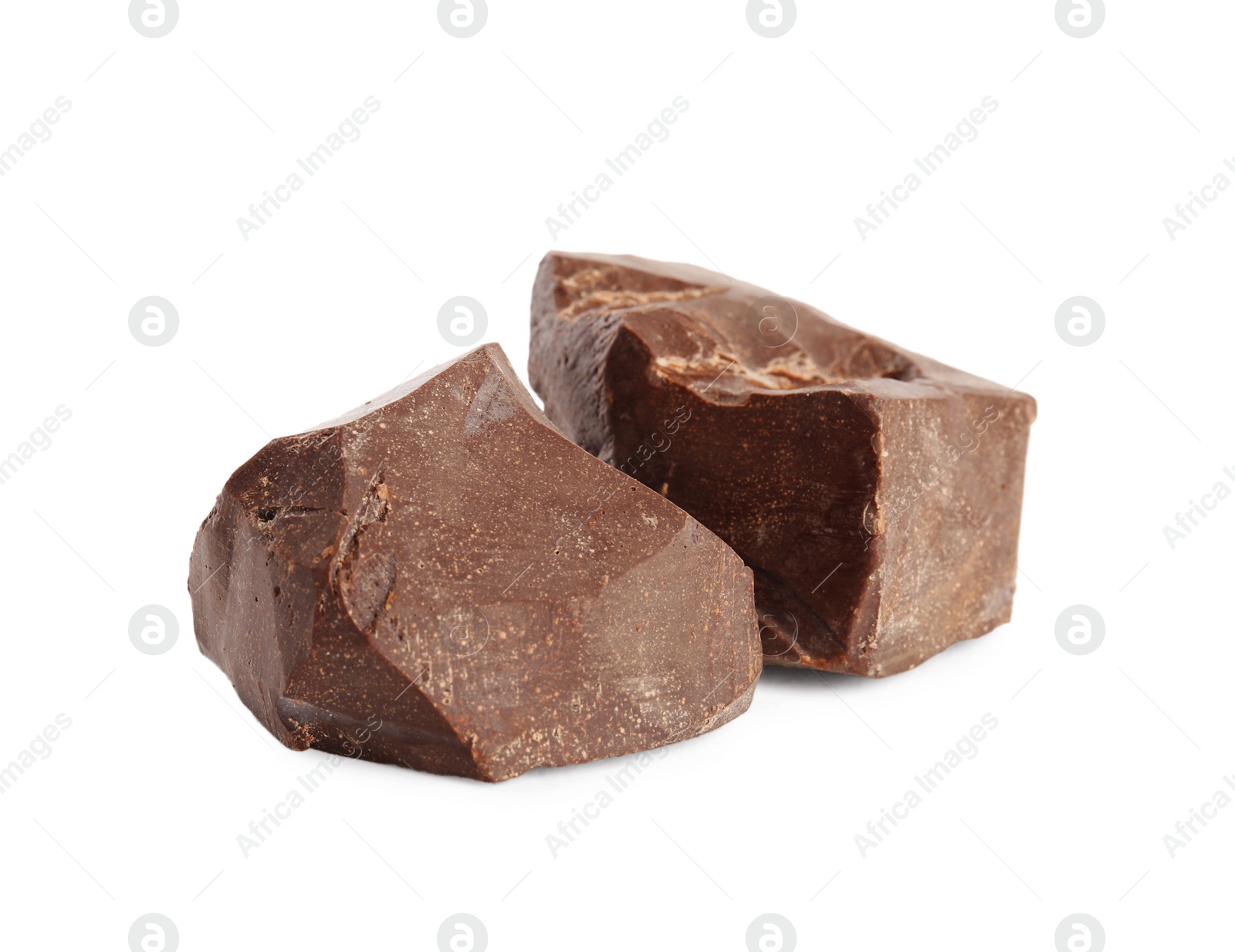 Photo of Pieces of tasty milk chocolate on white background