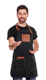 Professional hairdresser wearing apron on white background
