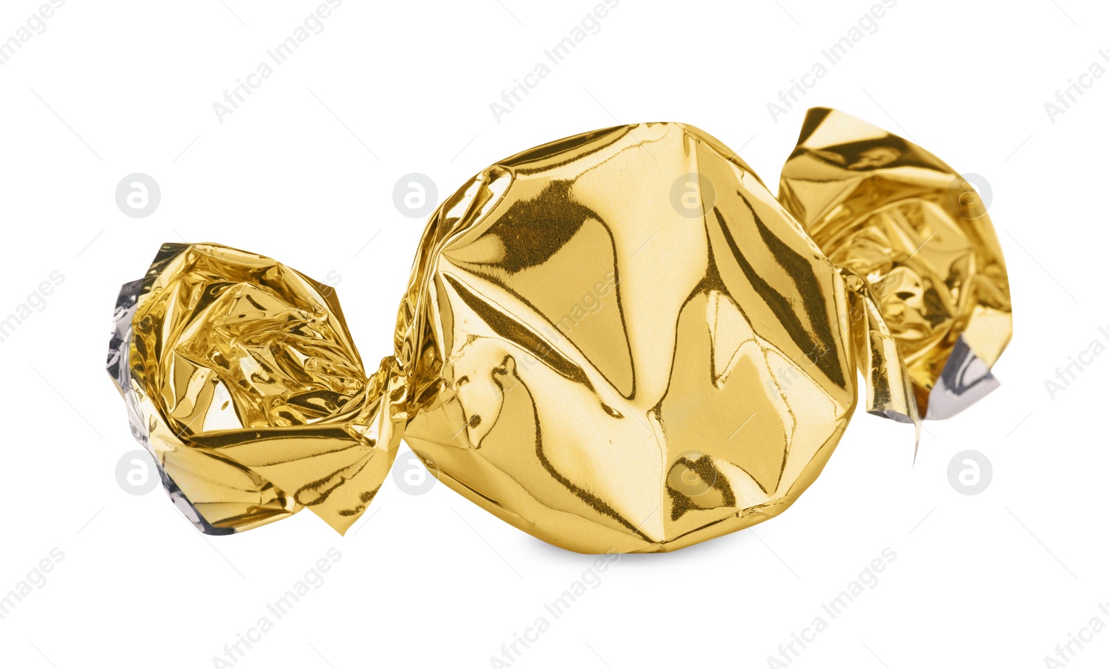 Photo of Candy in golden wrapper isolated on white