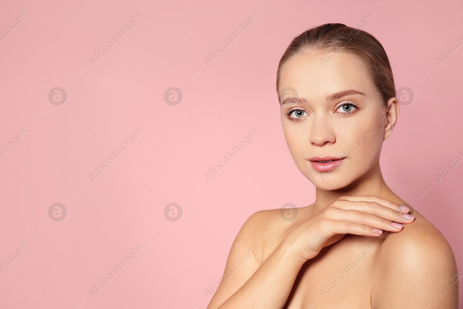 Photo of Portrait of beautiful young woman and space for text on color background. Cosmetic surgery concept