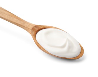 Photo of Wooden spoon with delicious sour cream isolated on white