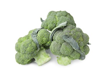 Photo of Fresh raw green broccoli isolated on white