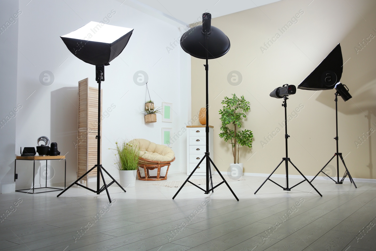 Photo of Example of living room interior design and professional equipment in photo studio