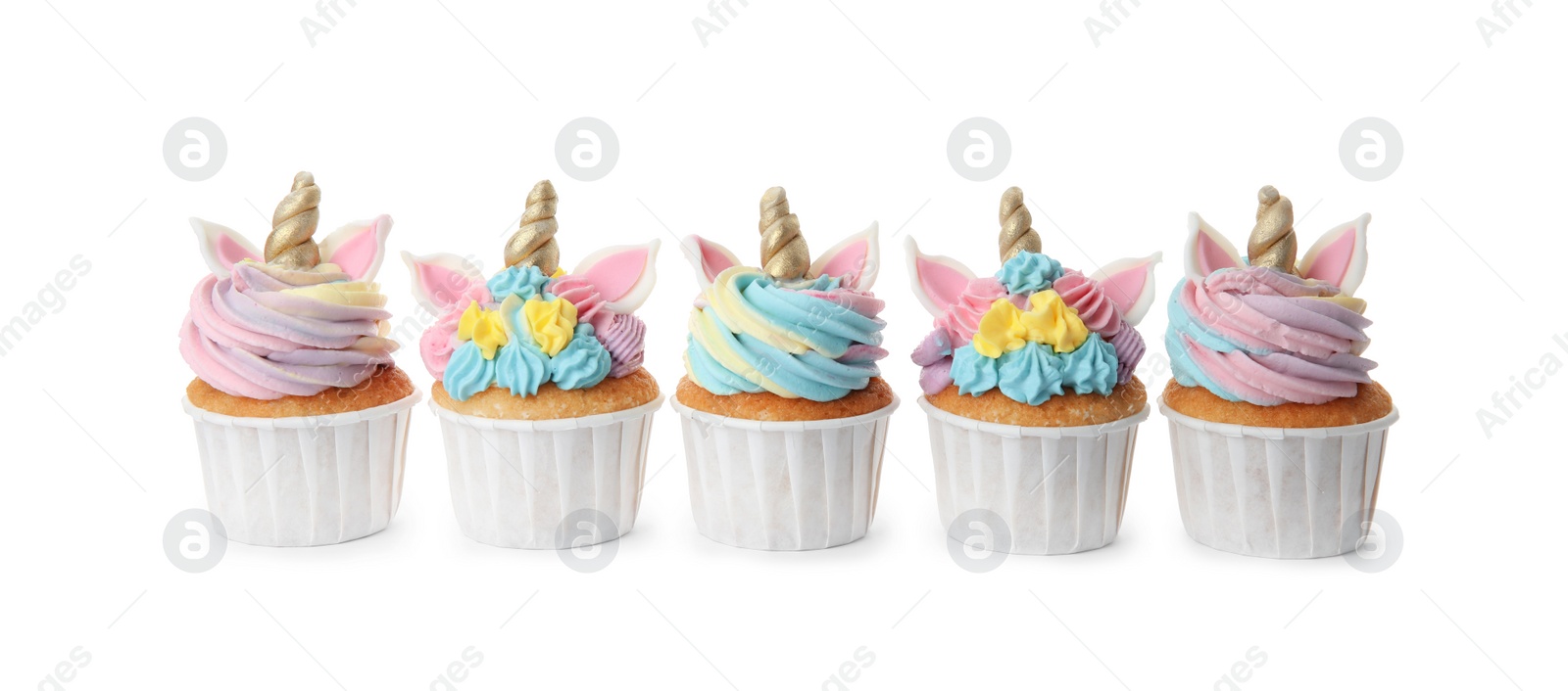 Photo of Many cute sweet unicorn cupcakes on white background