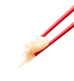 Photo of Chopsticks with pickled ginger on white background