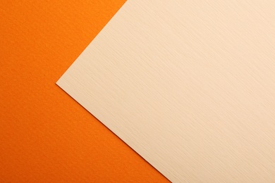 Colorful paper sheets as background, top view