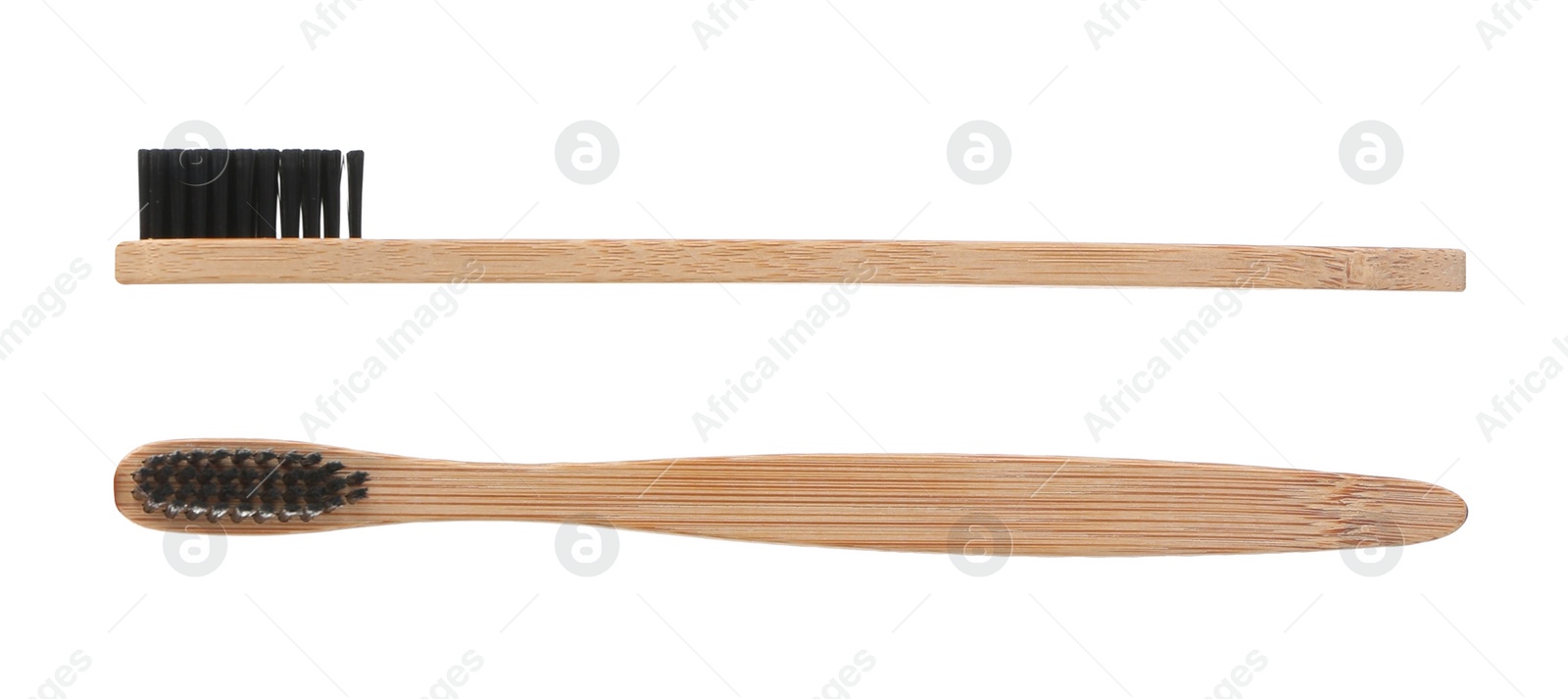 Image of Bamboo toothbrushes with charcoal bristles on white background 