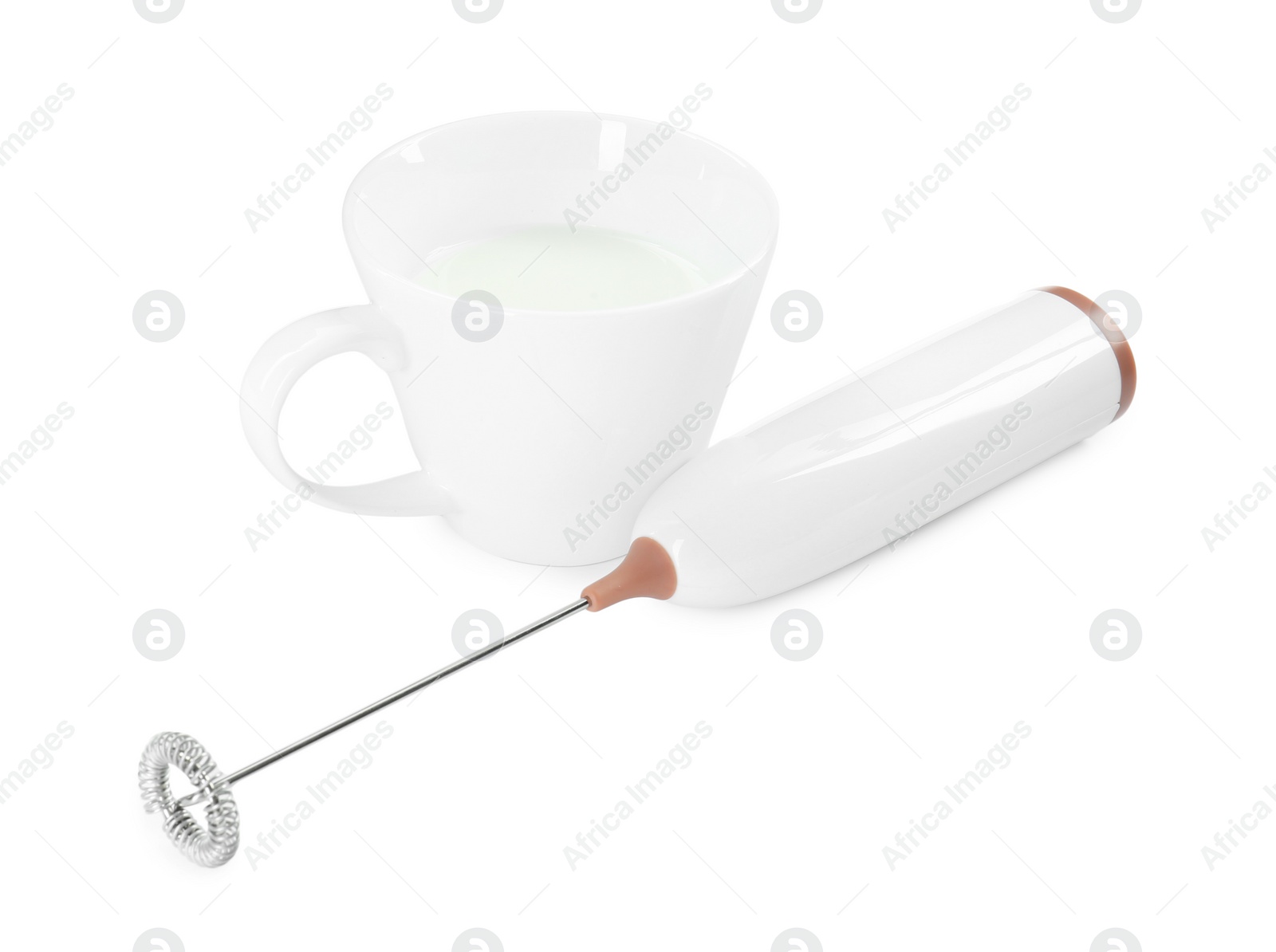 Photo of Milk frother wand and cup isolated on white