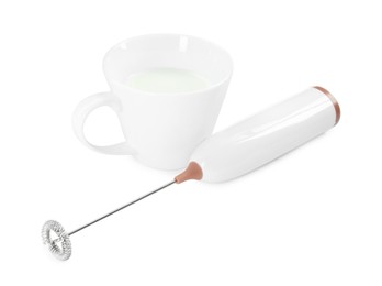 Photo of Milk frother wand and cup isolated on white