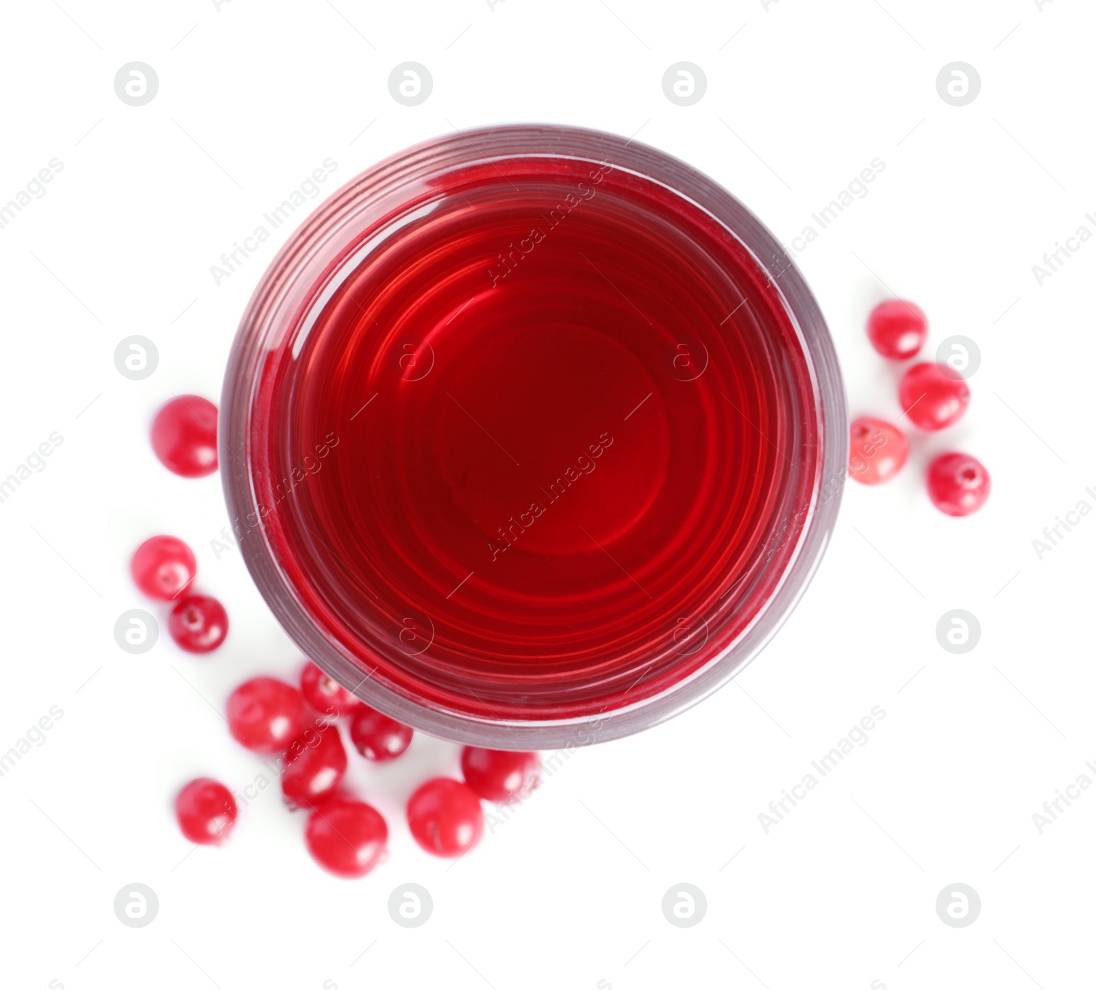 Photo of Tasty cranberry juice in glass and fresh berries isolated on white, top view