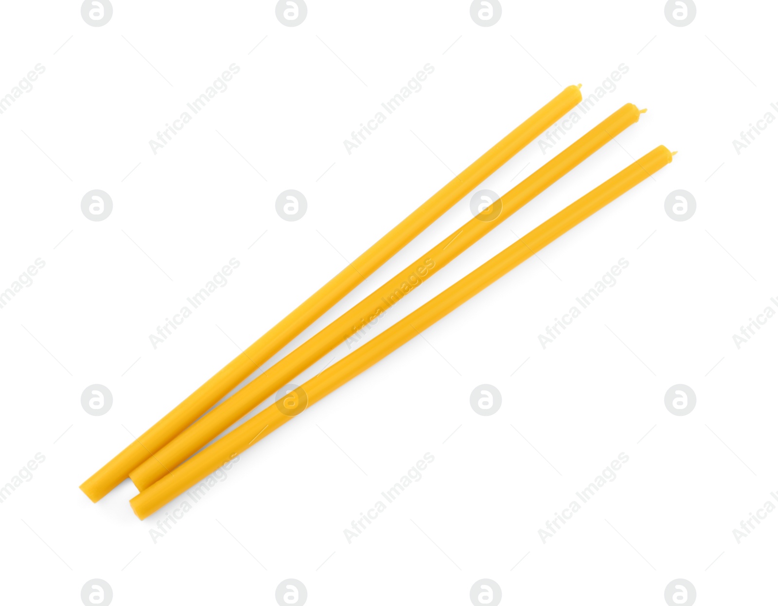 Photo of New church candles on white background, top view