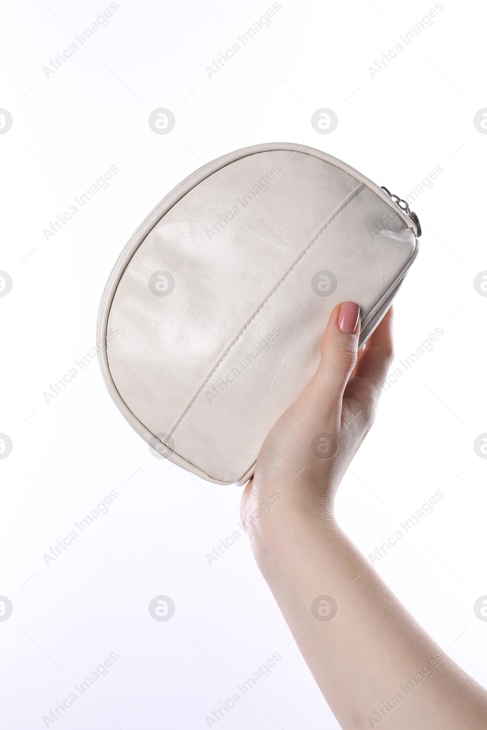 Photo of Woman with cosmetic bag isolated on white, closeup