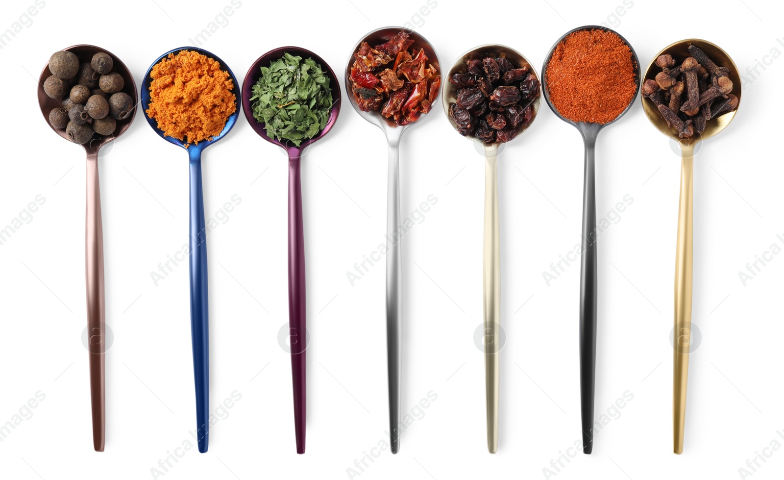 Photo of Metal spoons with different spices on white background, top view