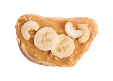Photo of Toast with tasty nut butter, banana slices and cashews isolated on white, top view
