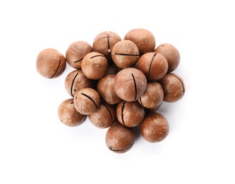 Photo of Pile of organic Macadamia nuts on white background, top view