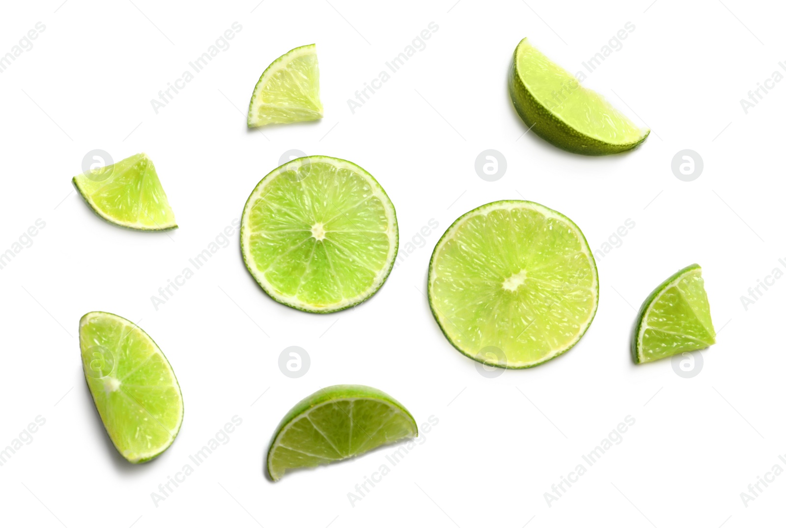 Photo of Fresh ripe limes on white background, top view